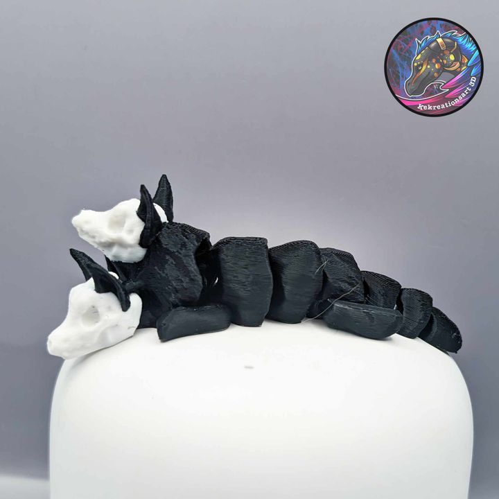 3D Printable Baby Flexi Cerberus Keychain by Kirsten M