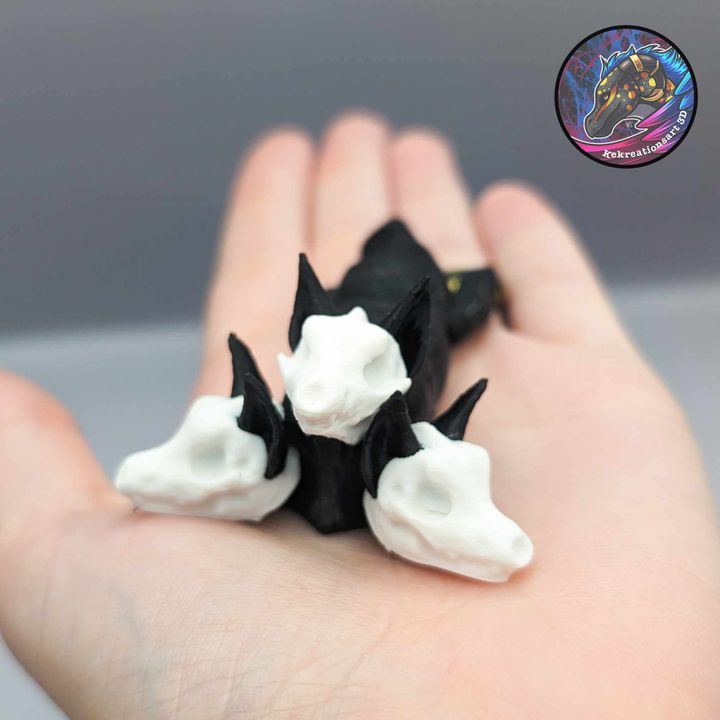 3D Printable Baby Flexi Cerberus Keychain by Kirsten M