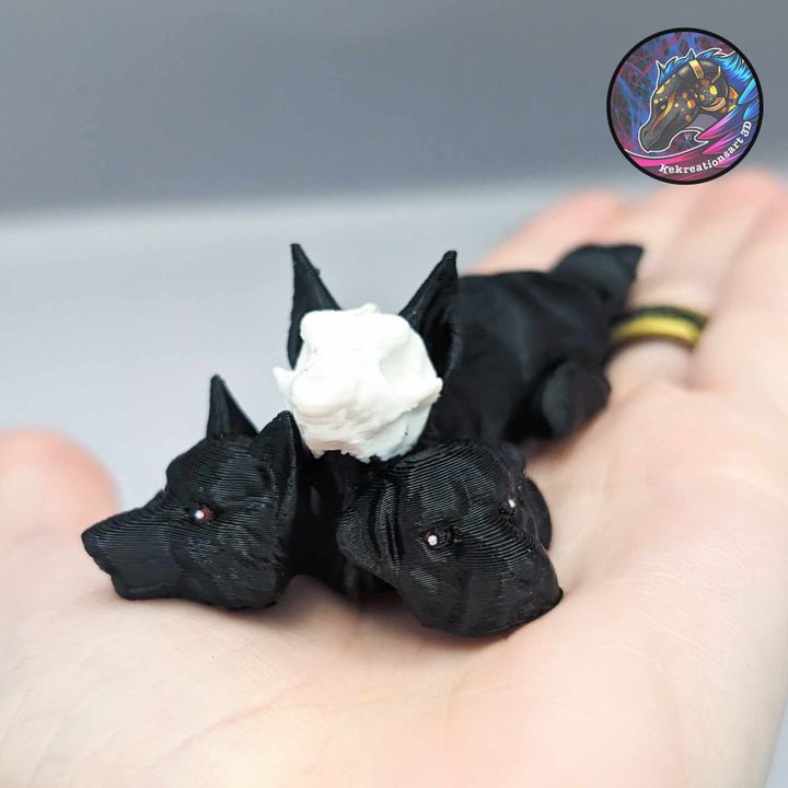 3D Printable Baby Flexi Cerberus Keychain by Kirsten M