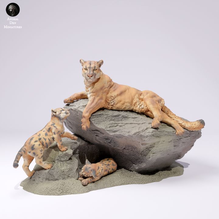 3D Printable Mountain Lions on a Rock by Animal Den Miniatures